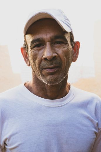 middle age man in baseball cap
